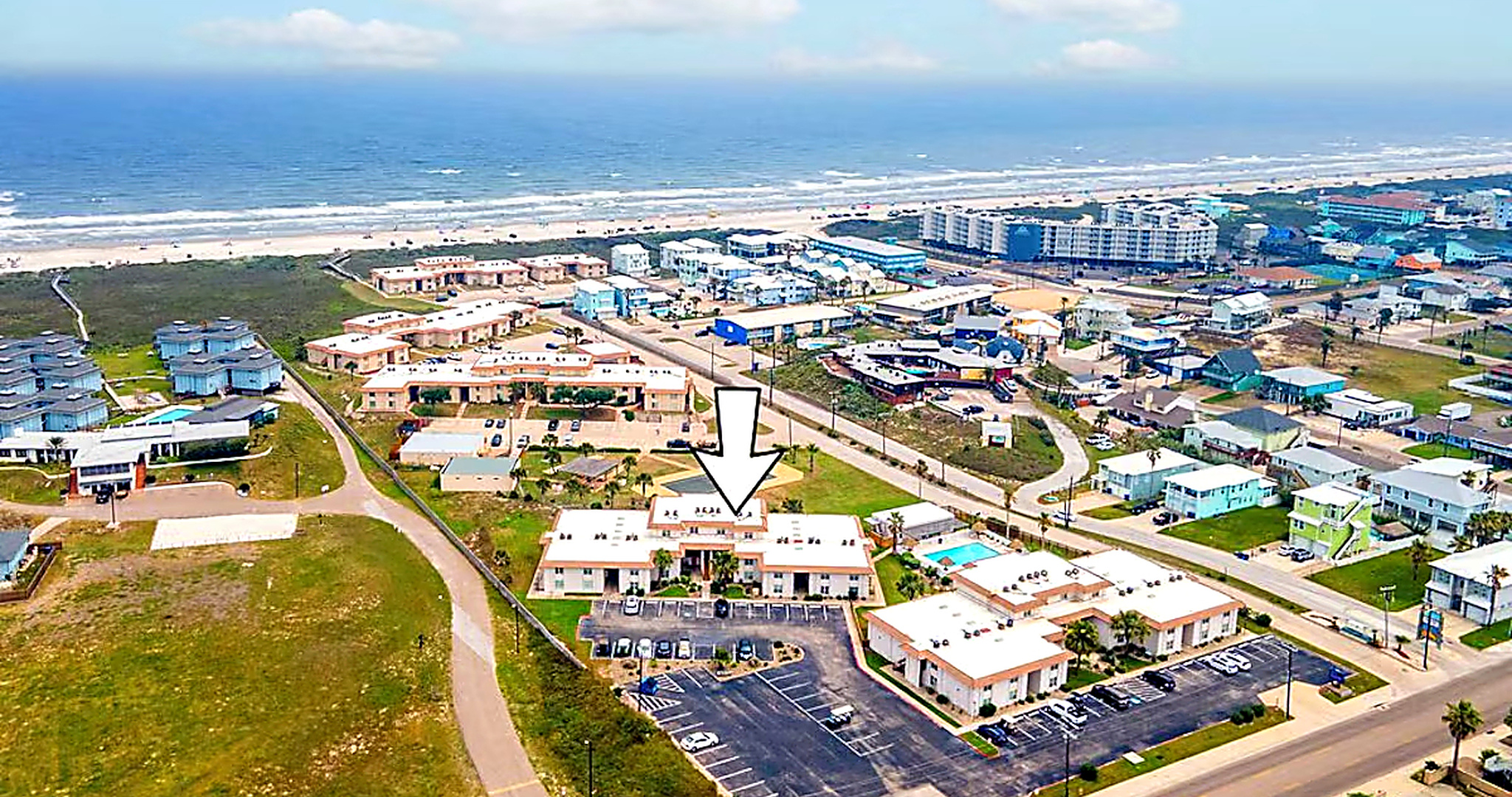 Arrow marking Port Aransas beach condo location just off the shoreline in Sea Sands complex